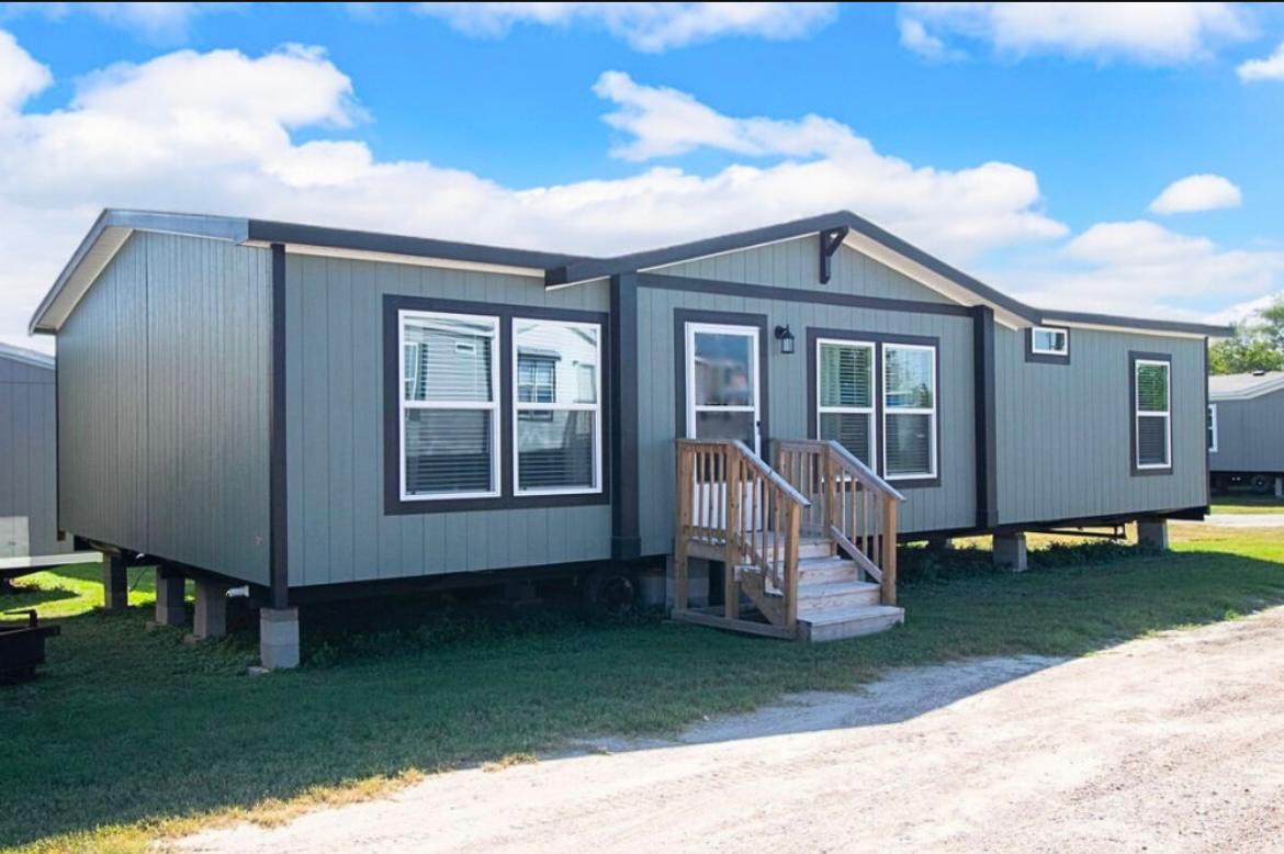 A 16x80 single-wide mobile home being relocated from a mobile home park in Georgia to a rural property in South Carolina, including escort vehicle, permit handling, and full setup services.
